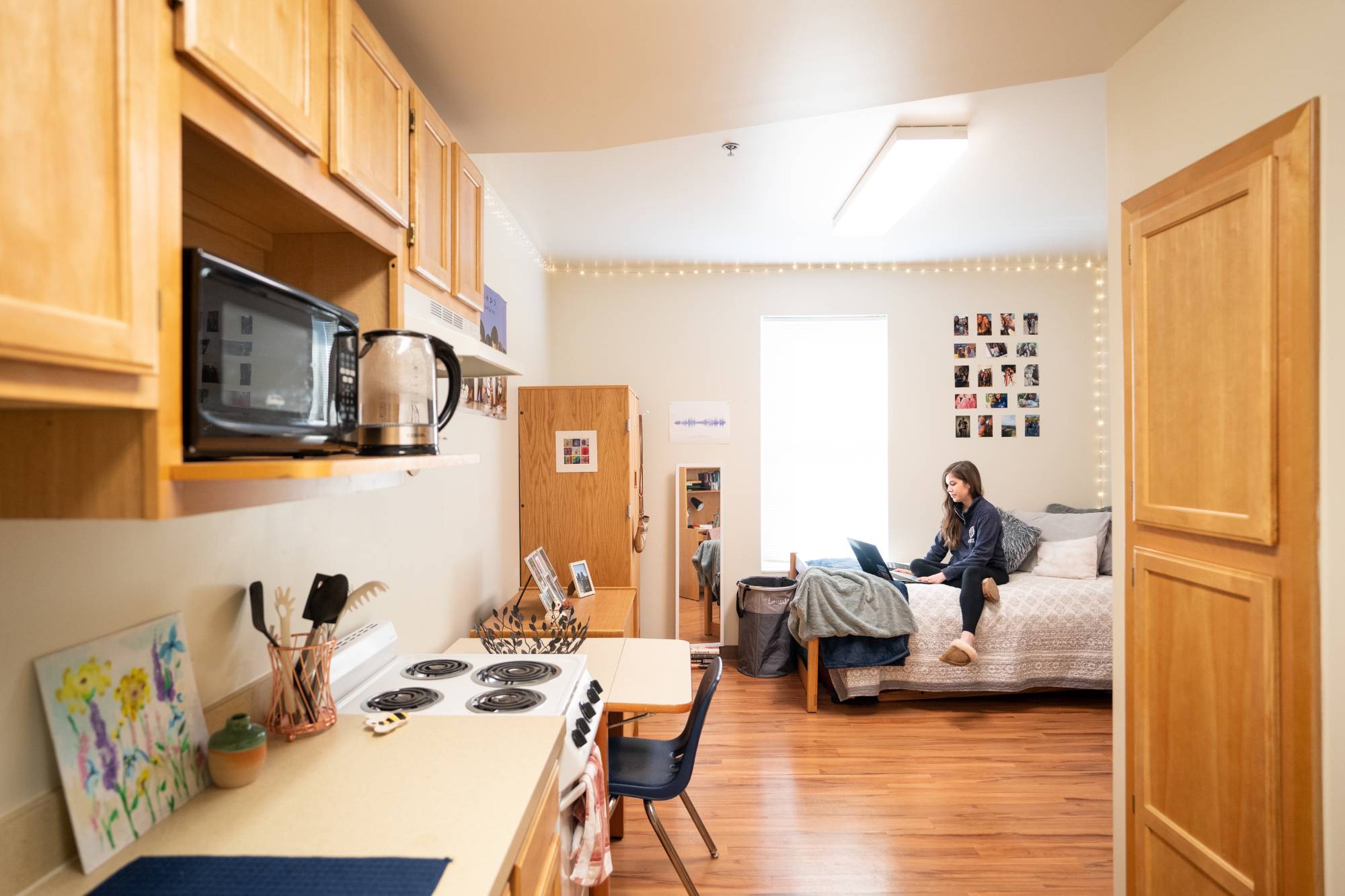 GVSU student studying in an on-campus apartment in Grand Rapids.